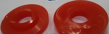 Прокладка амортизатора кабины (втулка-проставка) МАЗ красный (полиуретан)